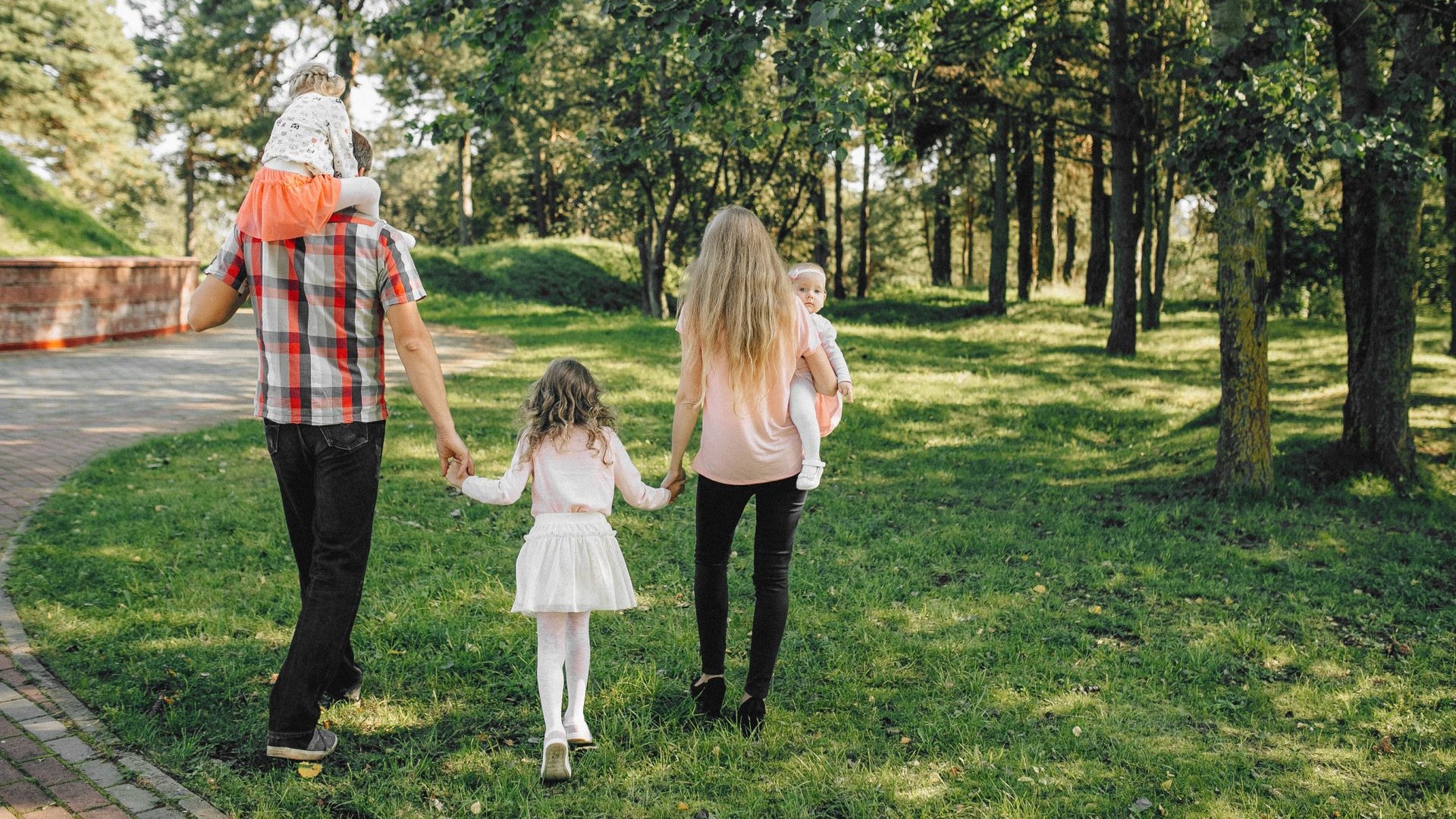 A family walking together along a Lancashire hillside